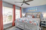 Coastal comfort awaits you in this beachy keen bedroom with king bed